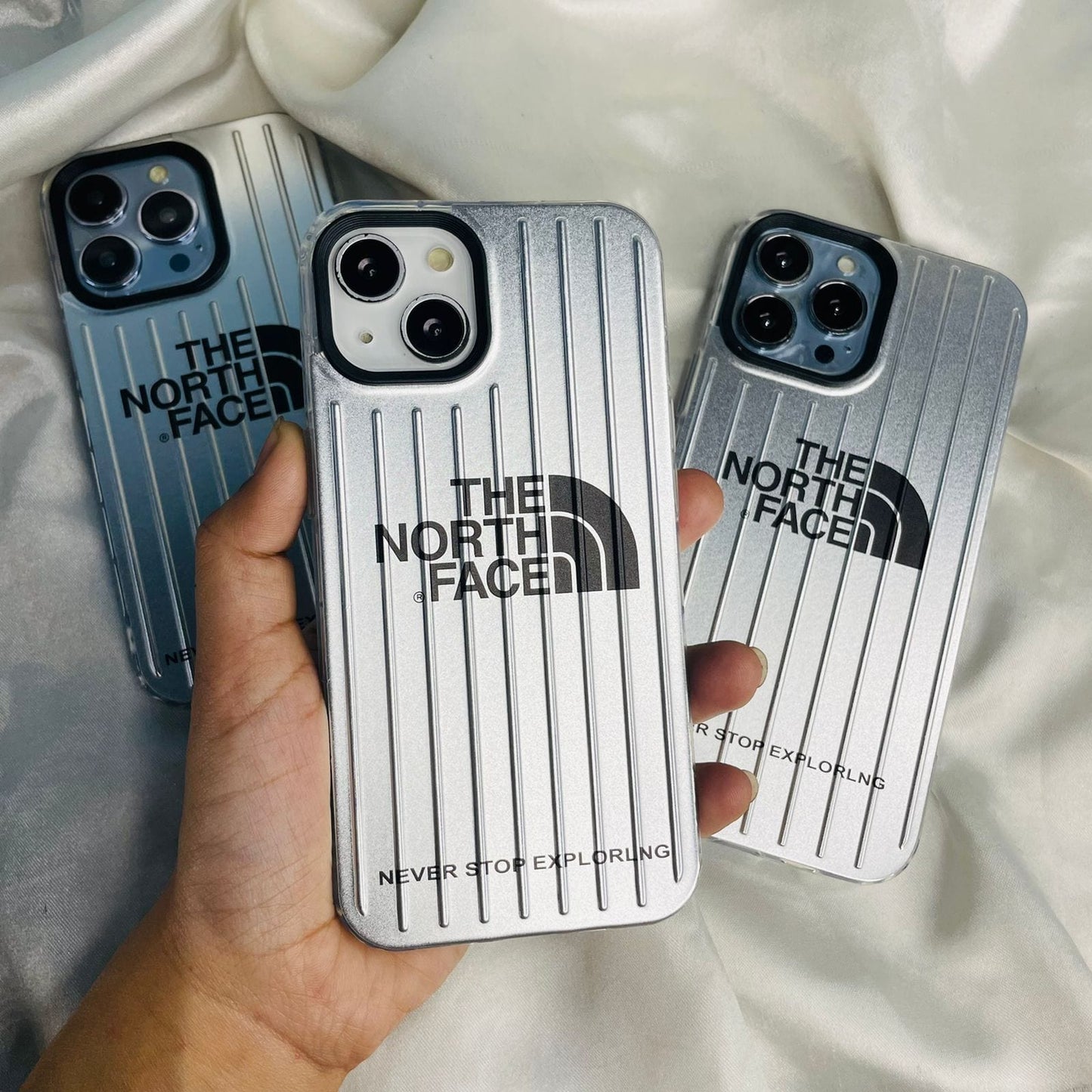The grey color TNF branded plating case